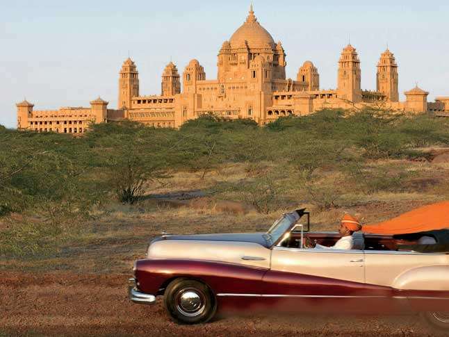Arriving by vintage car to the Umaid Bhawan Palace in Jodhpur, Rajasthan