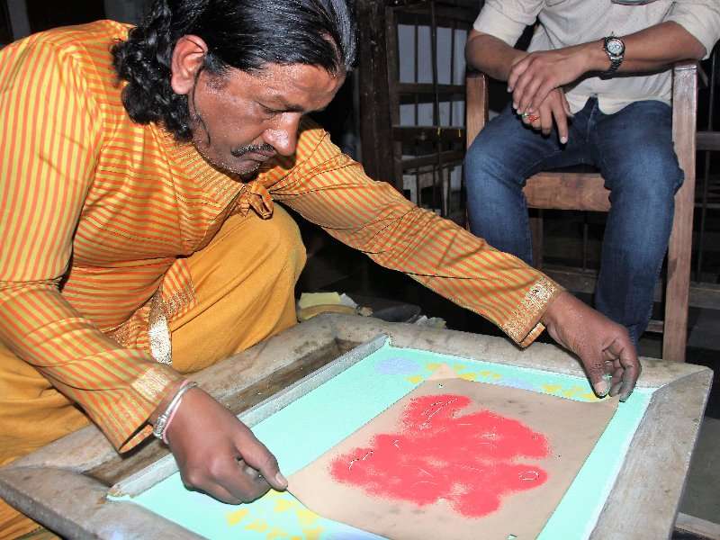 Jal Sanjhi painting on water in Udaipur Rajasthan