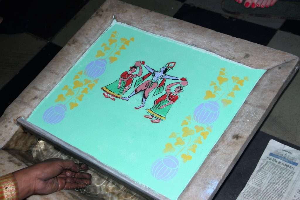 Jal sanjhi painting on water in Udaipur Rajasthan