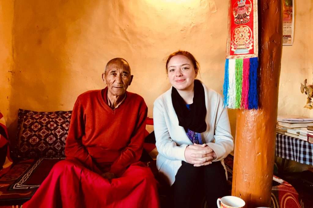 Madeleine Hann with Buddhist monk in Leh Ladakh, India