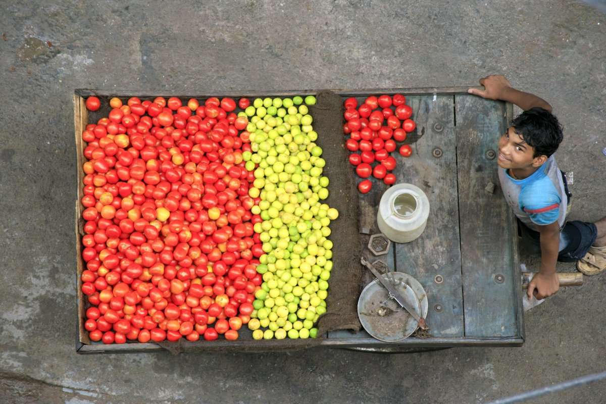 colourful veg seller in delhi, indian excursions co