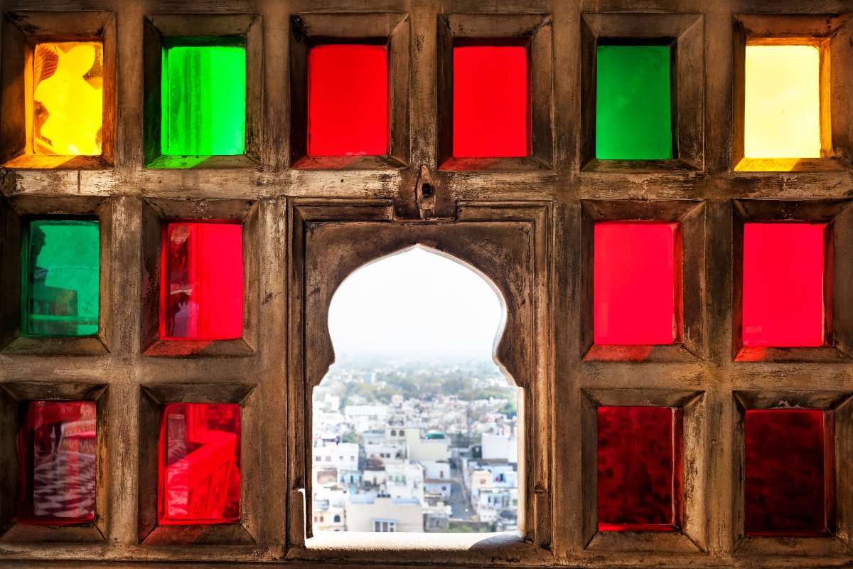 Colourful window at City Palace in Udaipur, indian excursions co
